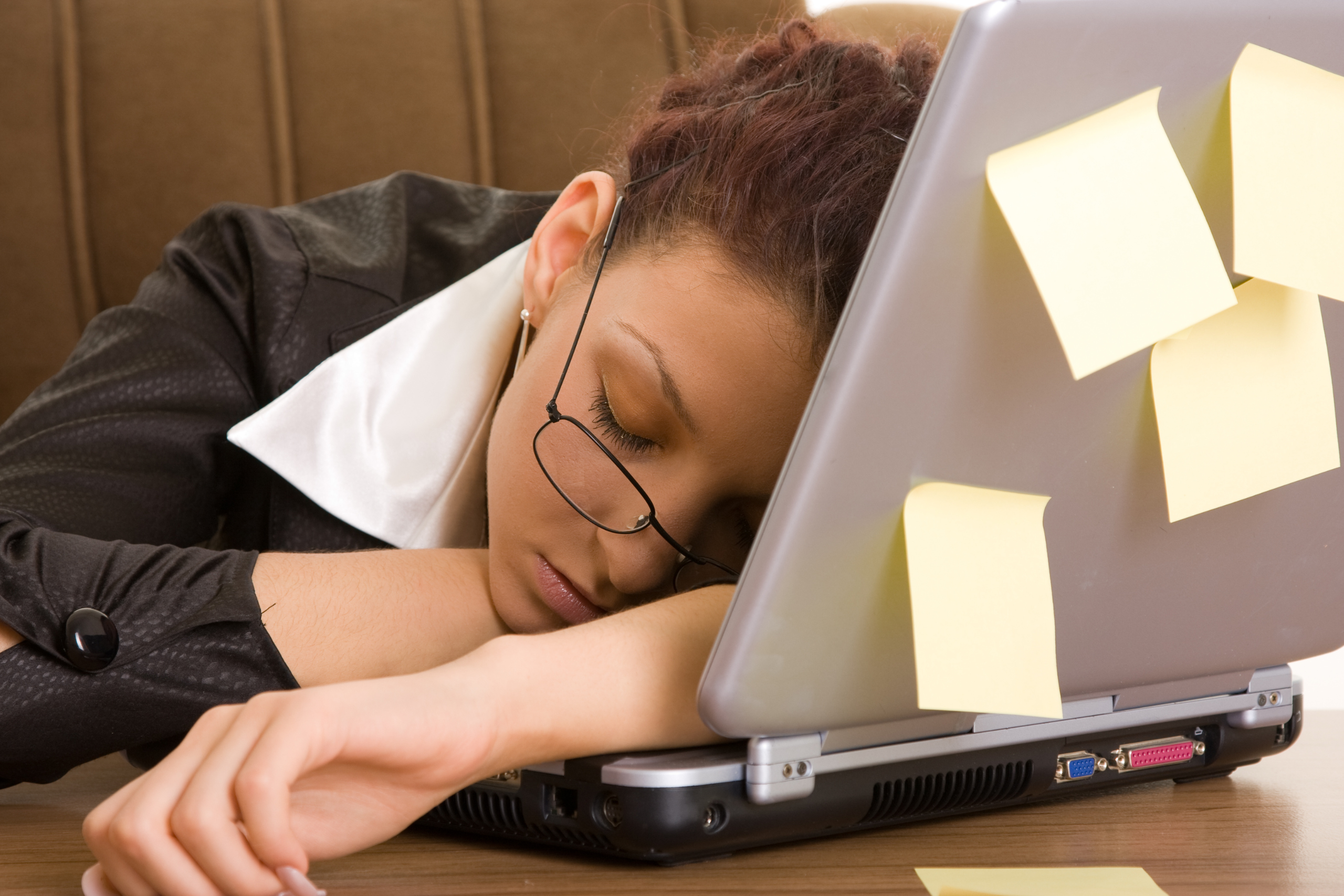 lady falls asleep at desk