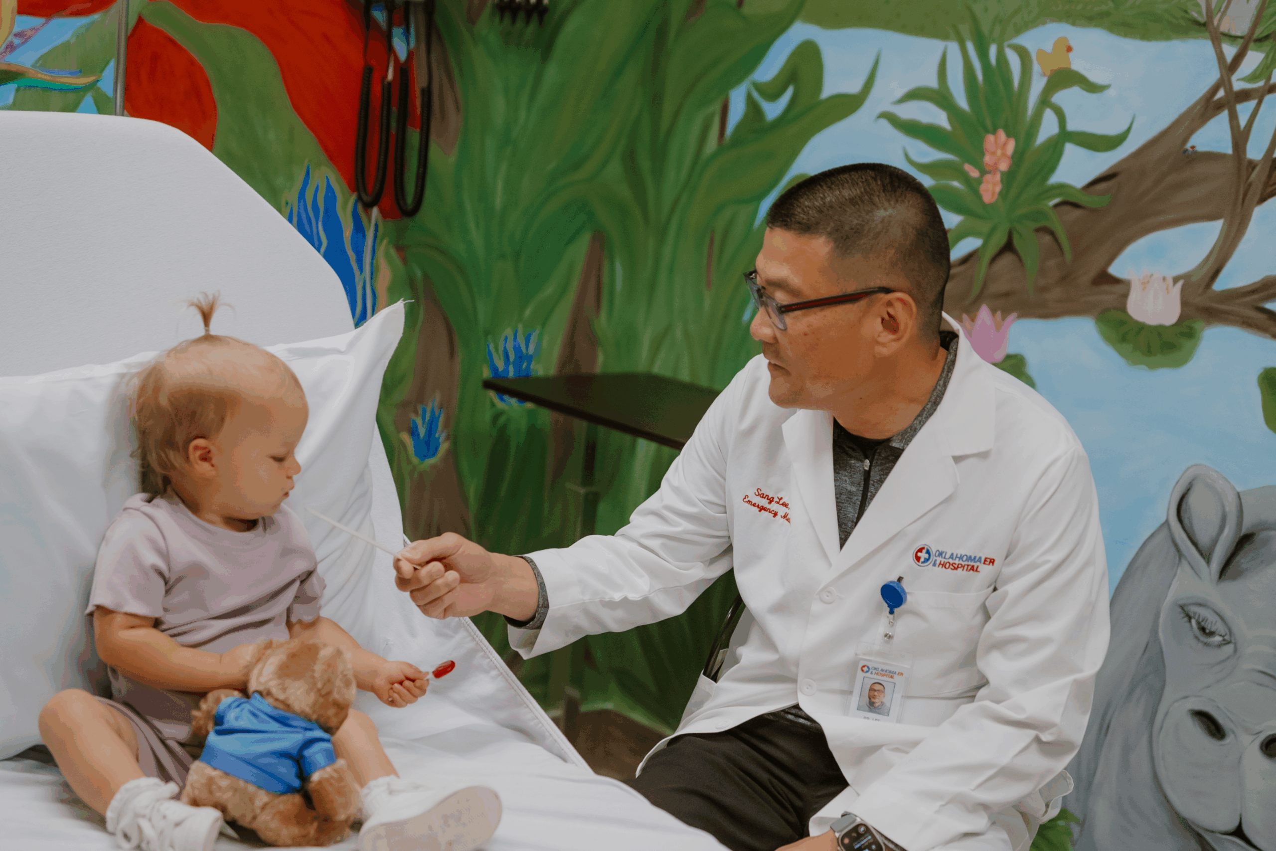 Oklahoma ER & Hospital physician with child