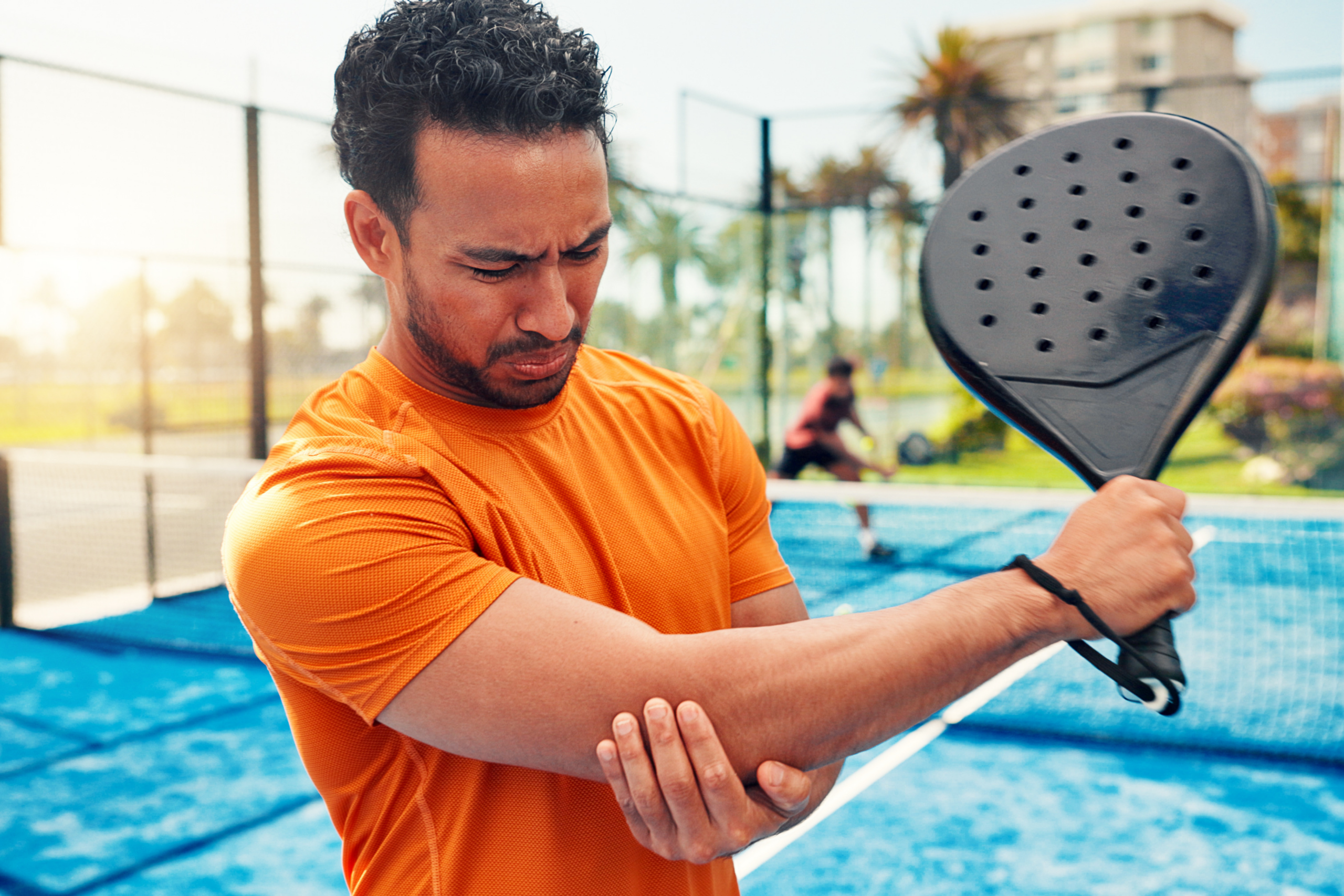 A man injures his arm while playing pickleball